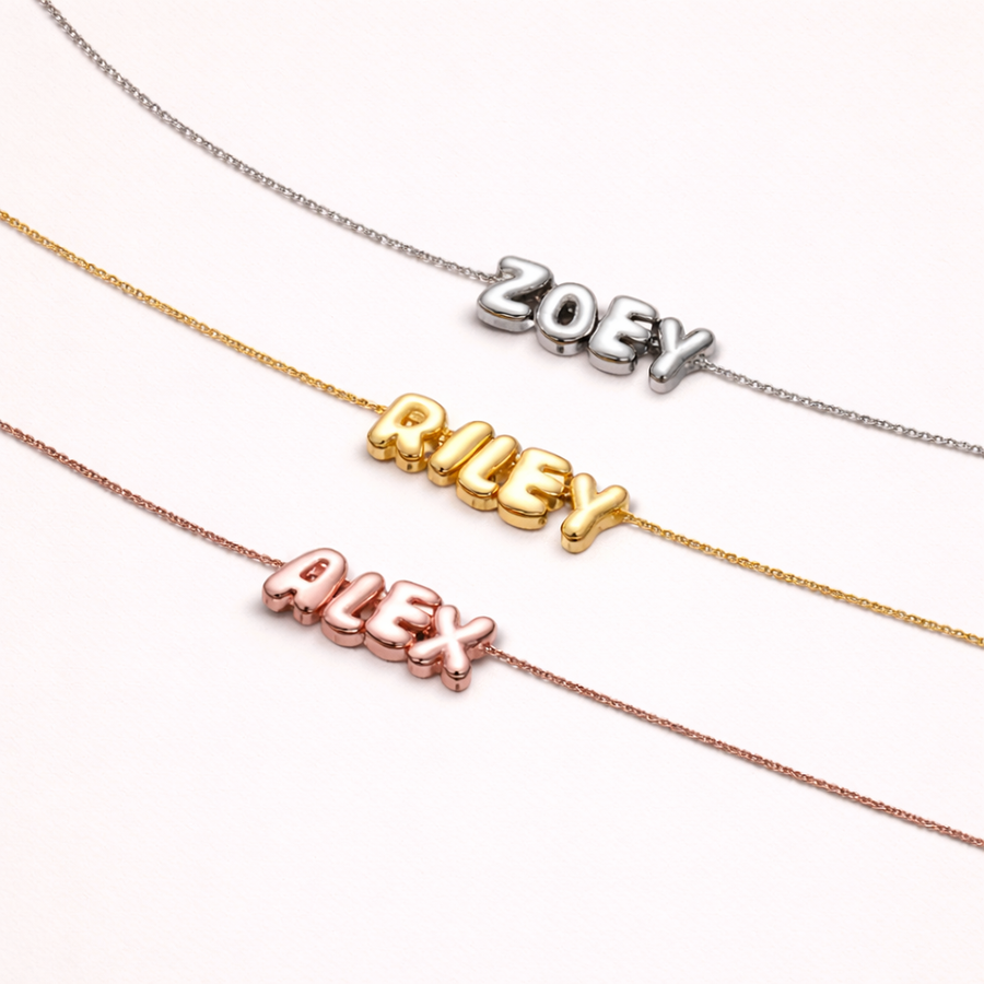 Three name necklaces in gold, silver, and rose gold 