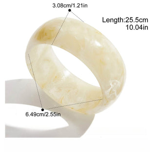 Beige bracelet with measurements on a white background