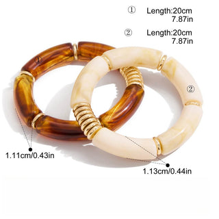 Two bracelets with measurements on a white background