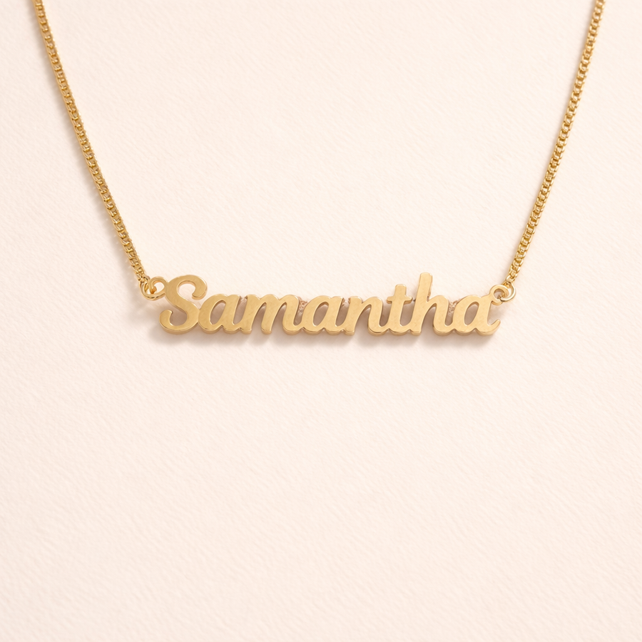Create a meaningful statement with a personalized name plate pendant. Sleek, lightweight, and perfect for everyday wear or gifting.