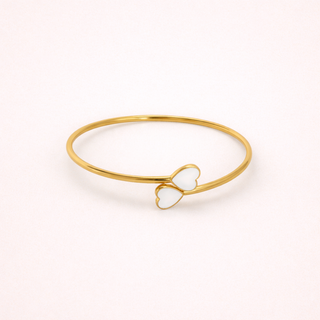 Duo Hearts Gold bracelet with a bow design 