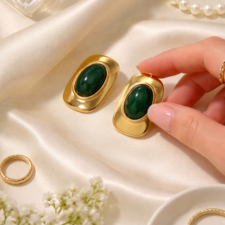 Gold earrings with green stones 