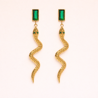 Gold snake-shaped earrings with green gemstones 