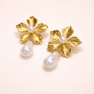 Gold flower-shaped earrings with pearl drops