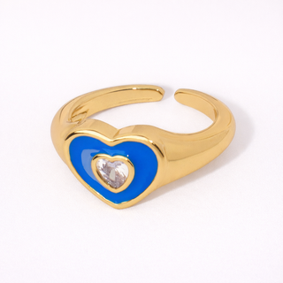 Gold ring with a blue heart-shaped stone