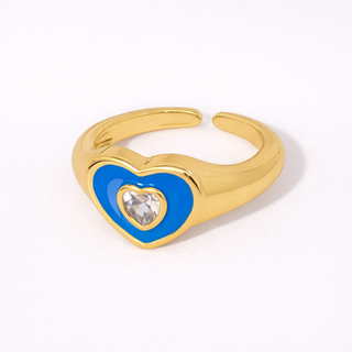 Gold ring with a blue heart-shaped stone 