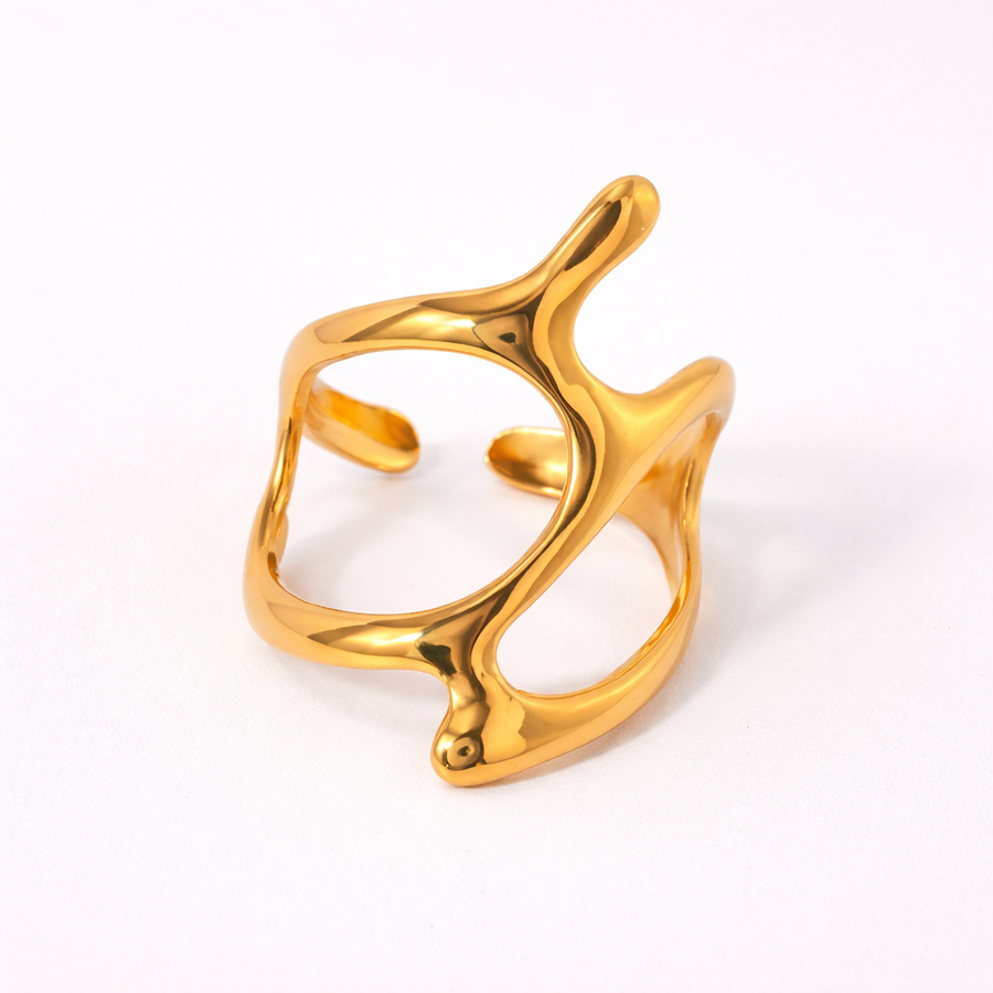 Gold open ring on a white background