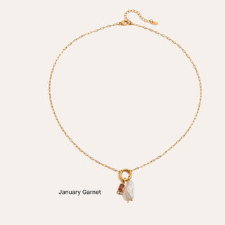 Gold necklace with a pendant on a white background, labeled 'January Garnet'.