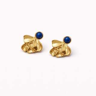 Gold earrings with blue gemstones
