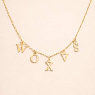 Delicate necklace featuring a single custom letter pendant. Lightweight, timeless, and perfect for everyday wear or gifting.