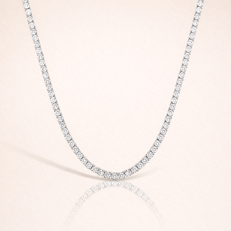 Diamond necklace on a light pink background