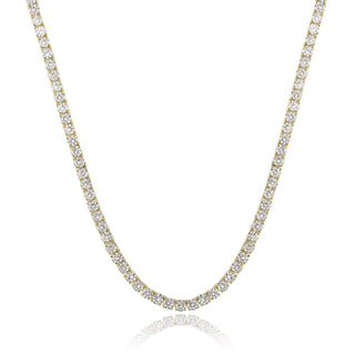 Gold necklace with diamonds on a white background