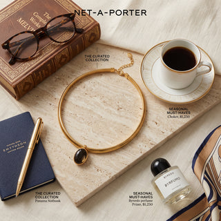 Layered Trio necklace styled on a desk with coffee and a magazine