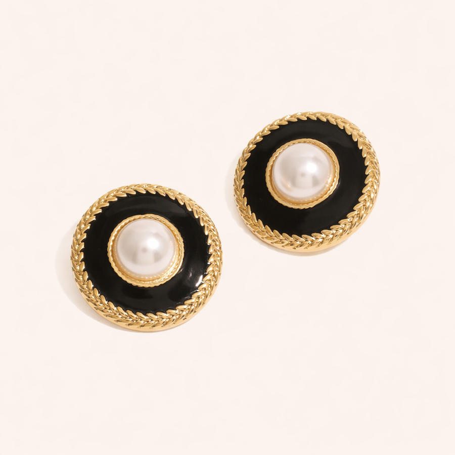 Pair of Lunara earrings with black circular design