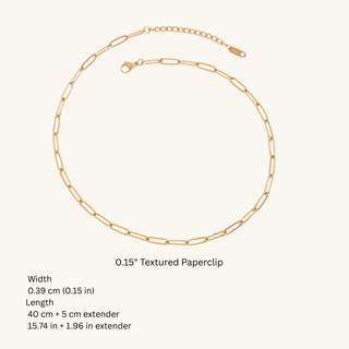 Gold necklace with paperclip links on a white background