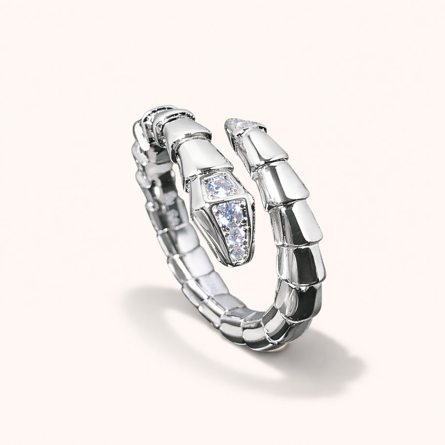Silver  snake ring with a diamond on a white background